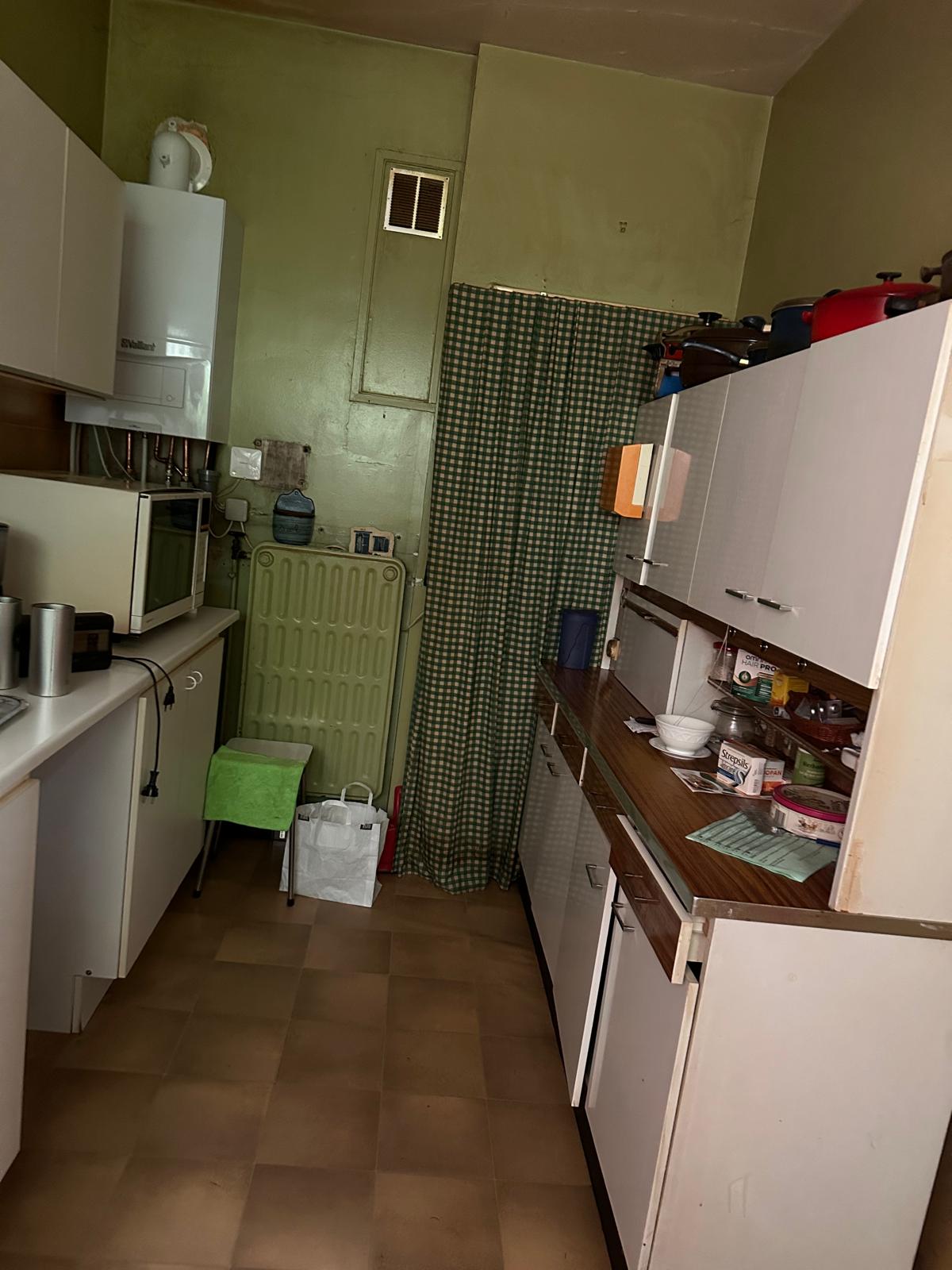 Vide maison Uccle - Salon avant débarras